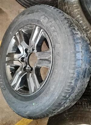 17inch Toyota Hilux/Fortuner mag with used 265/65/17 tyre to use for spare wheel
