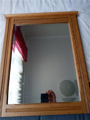 Bevelled regtangular mirror in a solid Oak frame