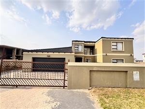 Elegant Double-Storey Home with 4 Garages, 2 bedroom Flatlet and Pool | A Must-See!