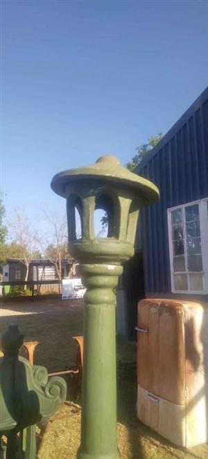 Concrete.. Victorian-style outdoor garden lamp post..