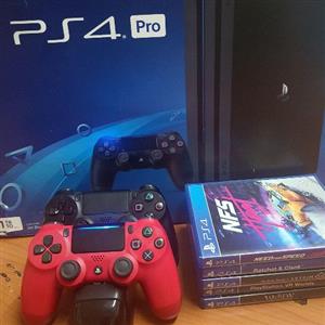 ps4 pro 1TB charging station 2 controllers 4 games