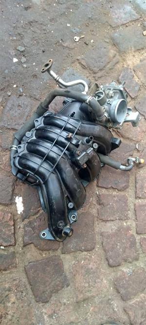 Suzuki swift engine code M15 A intake