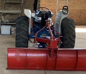TRACTOR AND IMPLEMENTS