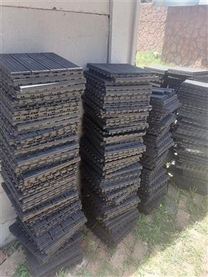 Interlocking plastic tiles 