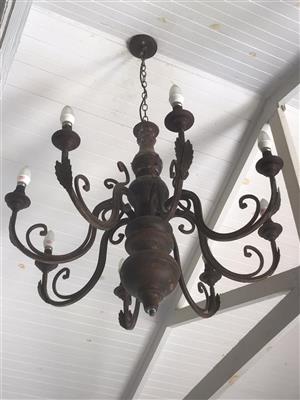 Wrought iron and wooden chandelier 