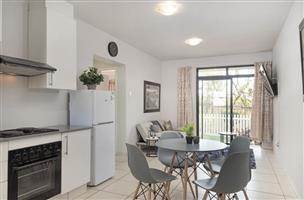 Charming 2-bedroom garden apartment for a great investment or starter home!