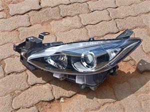 Mazda 3 headlight left side