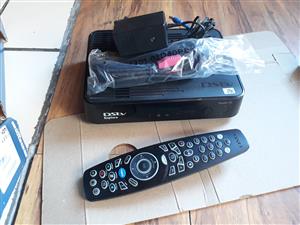 Dstv Explora decoder in good  condition  with all wires and  remote and paper wo