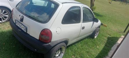Opel corsa 2004 model drives well need little attention lisence 4 years behind h