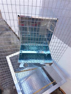 J - FEEDERS for RABBITS, GERBILS, TURKEYS. Pan pussing through welded mesh