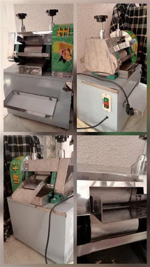 Sugar cane juicer