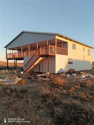 Nutec house and log cabin house