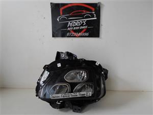 Suzuki Fronx / Starlet left headlight 23-