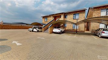 Stylish 2-Bedroom Ground Floor Unit Featuring Exclusive-Use Courtyard and Solar Power