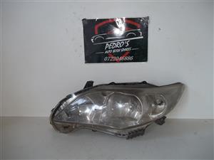 Toyota Quest left headlight
