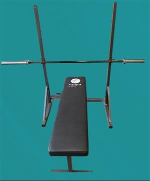 Bench, squat rack and barbell for sale