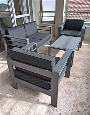 Patio Warehouse furniture set.  Excellent condition. Been under cover.  Only a year old. 