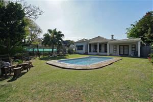 Beautiful Farm Style Family Home with 3 Income Generating Garden Cottages - A must see!!