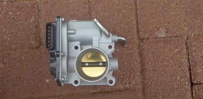 YARIS THROTTLE BODY. 2 NZ ENGINE CODE. BRAND NEW. FOR VARIOUS OTHER CARS TOO.