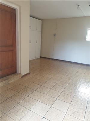 Spacious bedroom with built in cupboards to rent in Savoy Estate