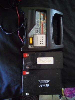 Battery charger and new extra batteries for sale, available in Sunridge park for