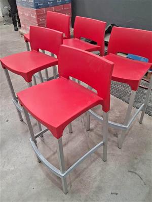 5 x Red Bar stools with steel legs  . Size 40 x 40 x 76. Collection in Rivergate