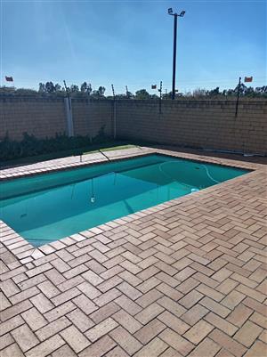 Step into luxury with this stunning duplex situated in the sought-after Riverspray Lifestyle Estate