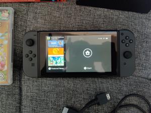 Nintendo switch Grey console used in good condition includes the charger