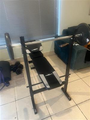 Bench Press. 20k weights.  Steel bar.