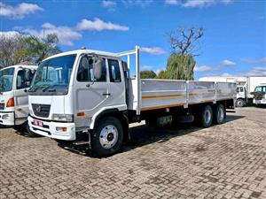 2015 Nissan UD90 Tag-Axle Mass-Dropside Truck 