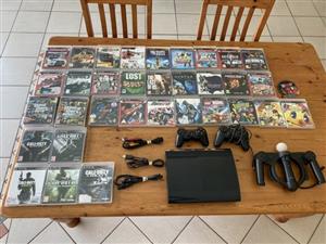 PS3 Slim 500 GB with controls & games