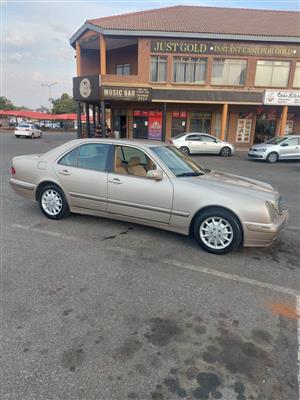 Mercedes Benz E240,1999 model,gold colour