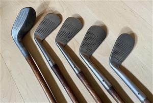 A set of 4 Vintage Golf Clubs - Irons numbers 3, 4, 5 and 6 and a putter.