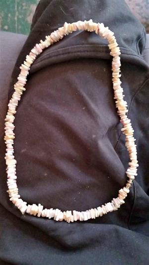 vintage light pink puka shell necklace.