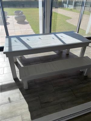 Six seater wooden table (1 500 x 850mm) and 2 x benches