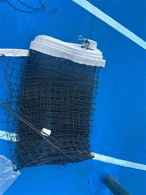 Tennis court netting and fencing.