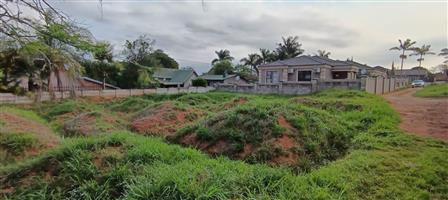 Vacant land in town with approved building plans. NO TRANSFER DUTY