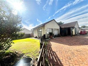Spacious 4-Bedroom Family Home with 4 Garages & Borehole
