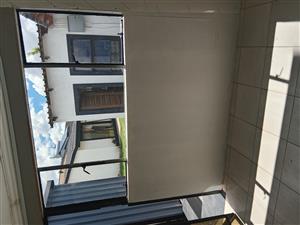  1 bedroom with ensuite bathroom with kitchenette, parking