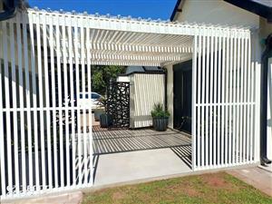Slat wood pergola