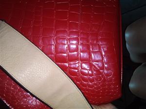 Real red leather handbag