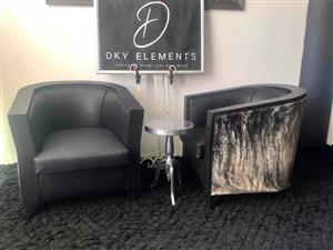Tub Chairs in Nguni Hide and Genuine Black leather. Priced per chair.
