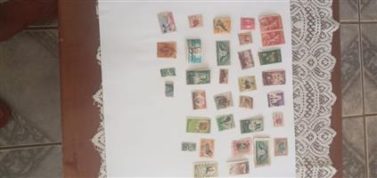 Stamps and coins for sale. dollar per stamp and per coin