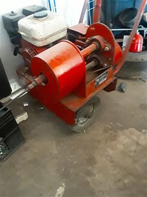 Plumbing drain rod machine