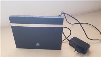 Huawei router, Sony speaker and TEAC DVD/CD and USB player 