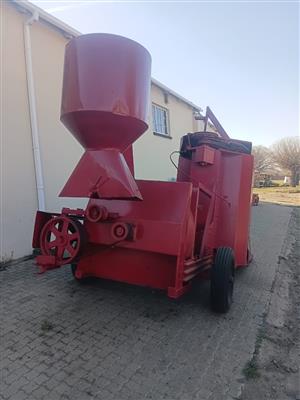 1 Row harvester with hammermill attached for sale