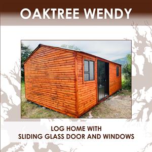 Log home with sliding glass door and windows