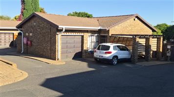 Three bedroom townhouse in secure complex.