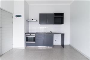 Two Spacious Bedrooms: Tiled throughout with modern built-in cupboards. Full Designer Bathroom: Includes both a soaking tub a