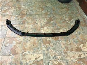 Polo 8 plastic gloss black front spoiler for sale